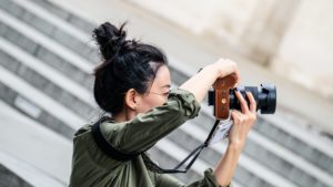 Summer Jobs for Teachers - Woman taking a photo