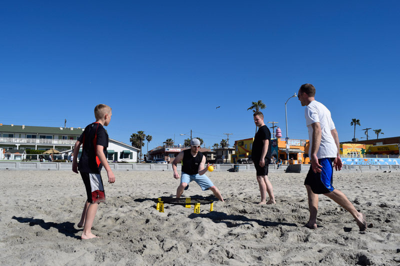 playing spike at Pacific Beach in San Diego