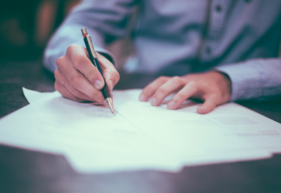 Man filling out forms