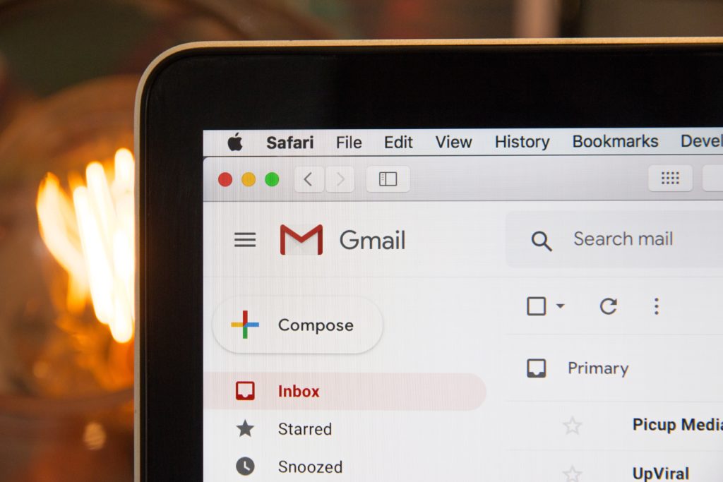 Laptop screen displaying an open Gmail account.