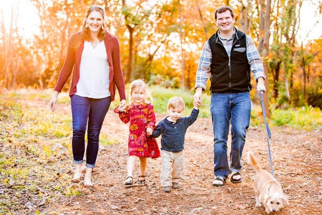 Ryan Russell with his wife, daughter, son, and puppy on a pleasant fall walk