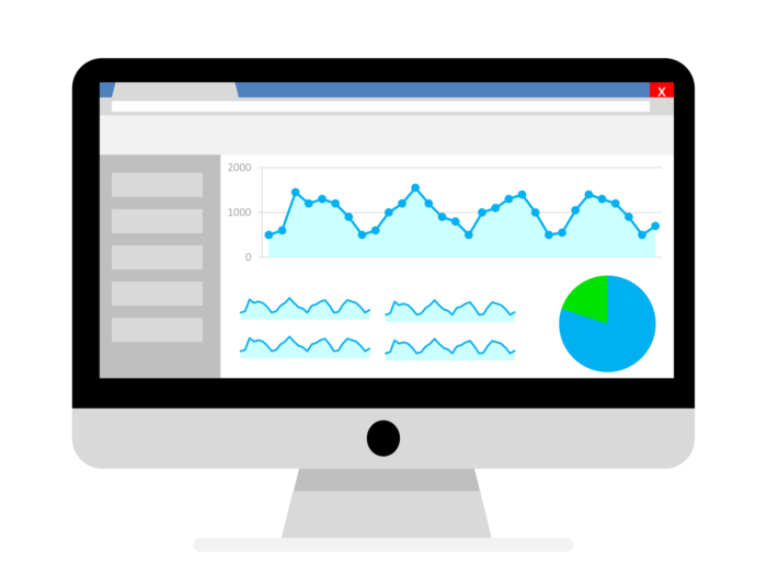 Digital graphic of a desktop computer with a spreadsheet open. 